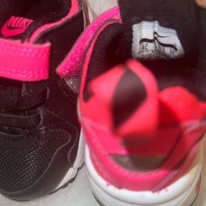 Nike pink and black sneakers
